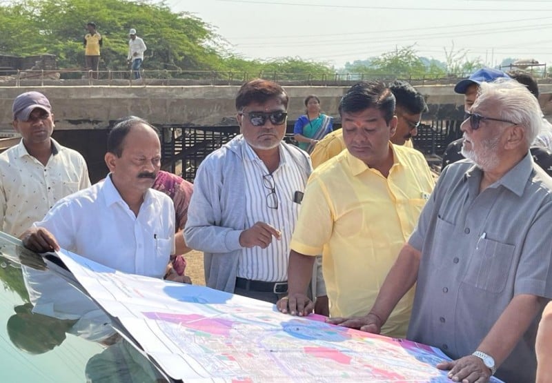 Anil Anna Gote (extreme right) at the site of one of his real estate projects