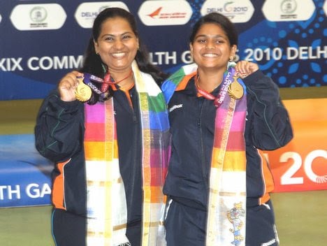 Anisa Sayyed along with Rahi Sarnobat posing with their medals at the Commonwealth Games 2010