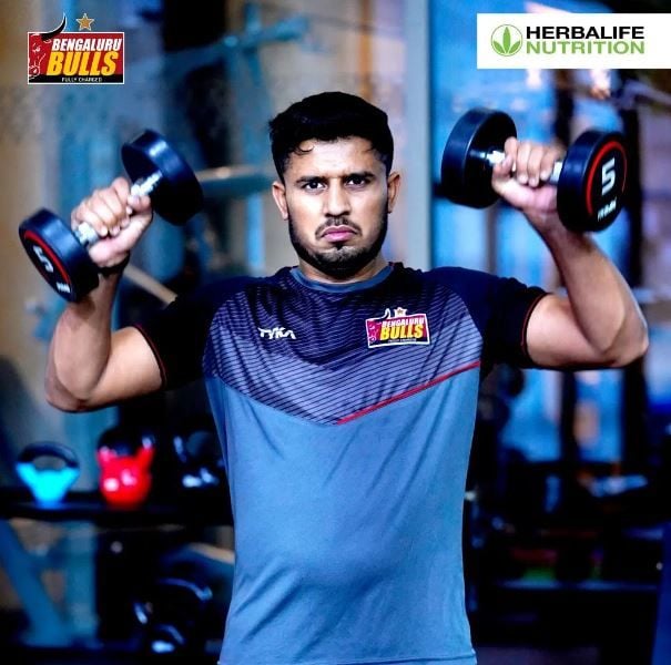 Ankit Malik while working out in a gym