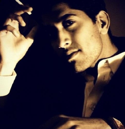 Ankur Bhatia holding a cigarette