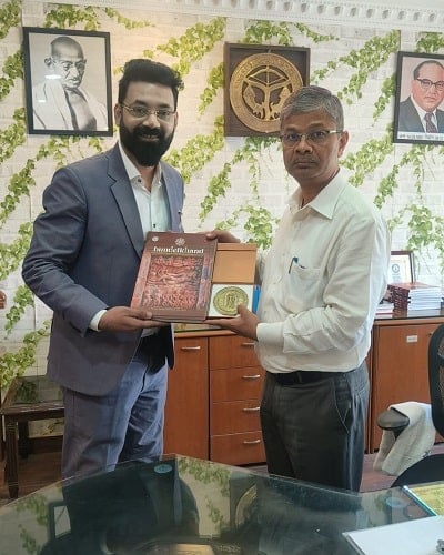 Ankush Anami being felicitated