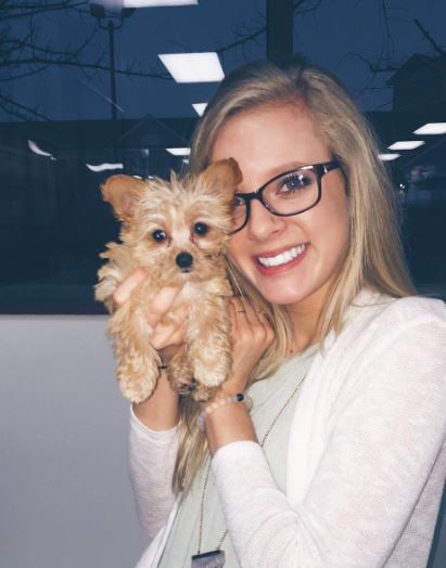 Annabelle Ham with a puppy