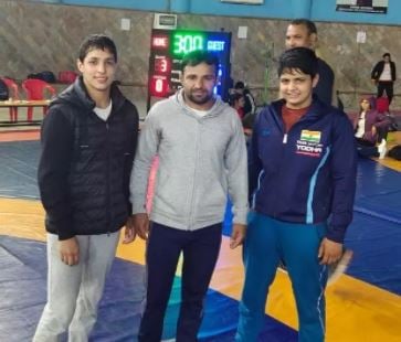 Anshu Malik with her coach Jagdish Sheoran