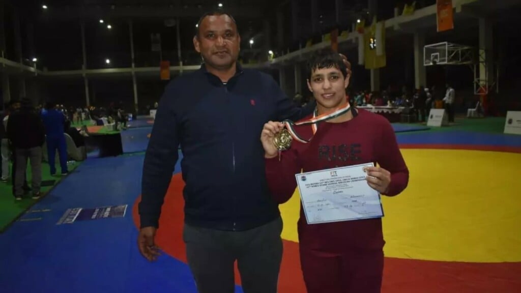 Anshu Malik with her father