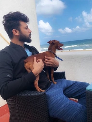 Anson Paul with his pet dog