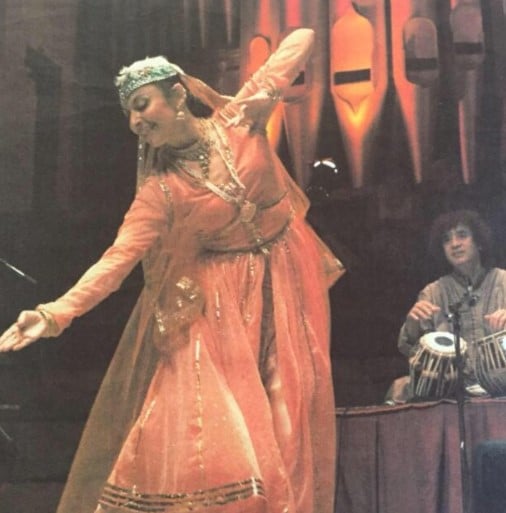 Antonia Minnecola dancing while Zakir Hussain plays tabla