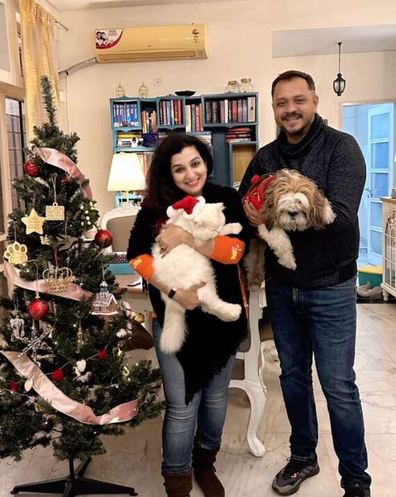 Anuj Gurwara and his wife with their pets