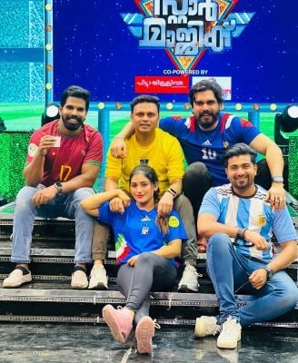 Anumol Anukutty with the cast and crew of Star Magic