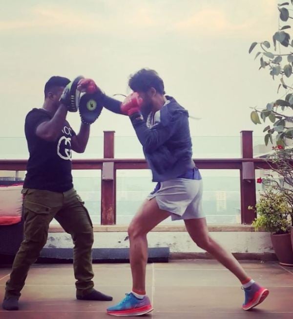 Anupam Mittal (right) while practicing boxingAnupam Mittal (right) while practicing boxing