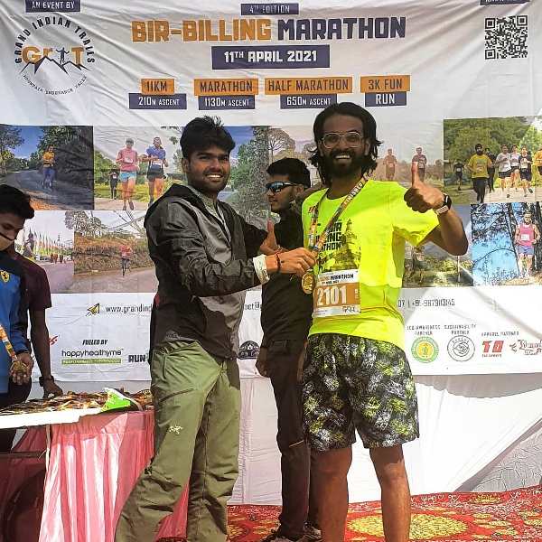 Anurag after receiving a medal for winning the Bir Billing half marathon