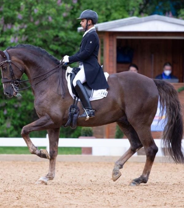 Anush Agarwalla with his horse, Sir Caramello Old