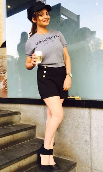 Anveshi Jain with a glass of beer