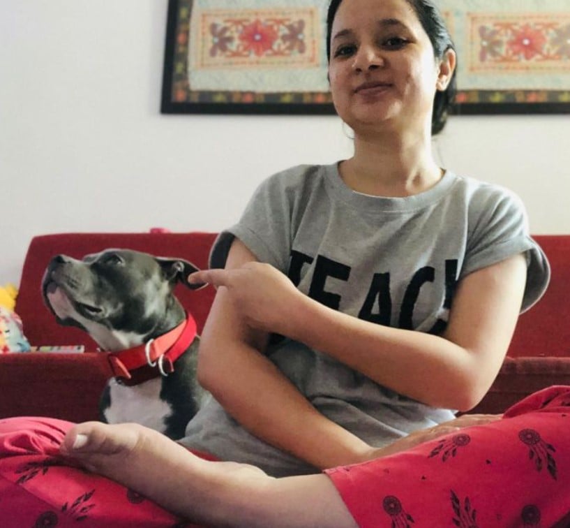 Aparna Moazzam with her dog