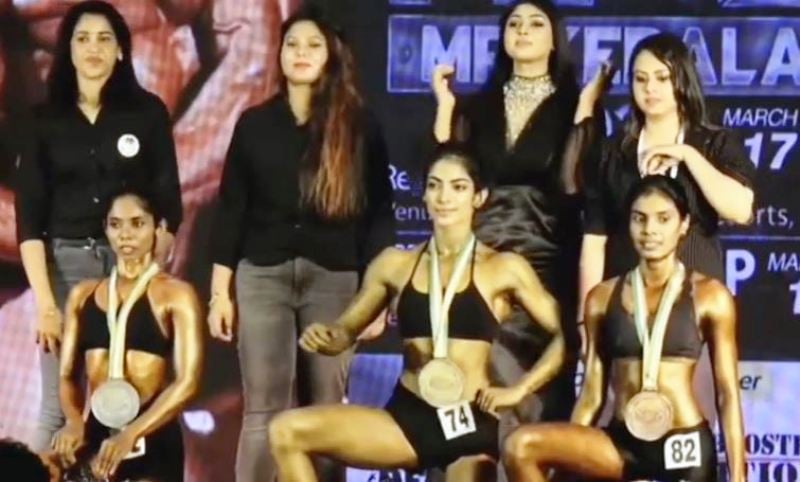 Arathy Krishna (centre, sitting) after winning the title of Miss Kerala 2022