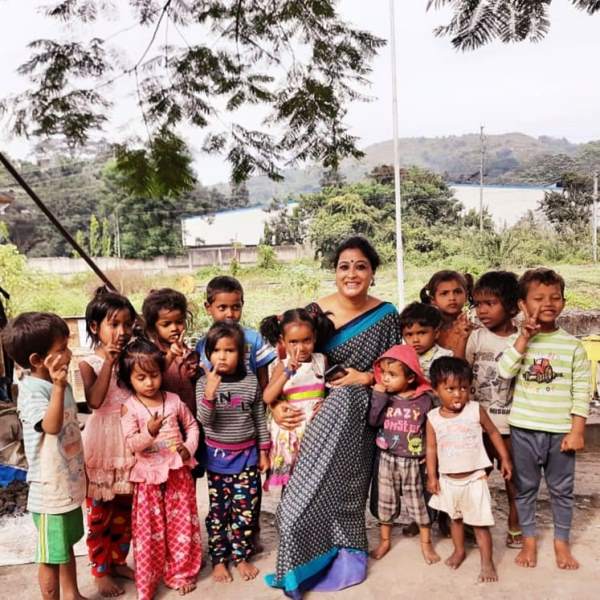Archana Borthakur spending time with slum children