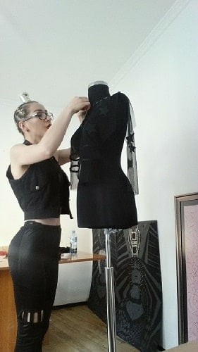 Arjeta Palushaj while designing her clothes