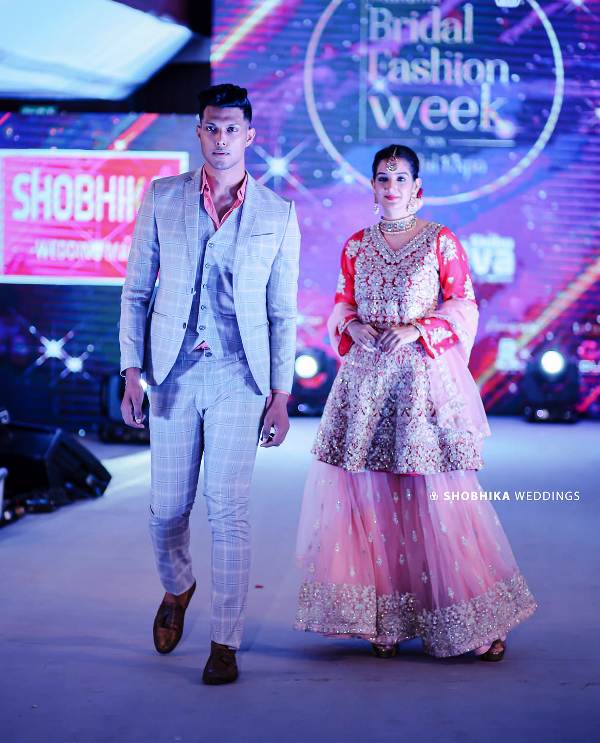 Arjun Syam Gopan walking the ramp at the Malabar Bridal Fashion Week (2021)