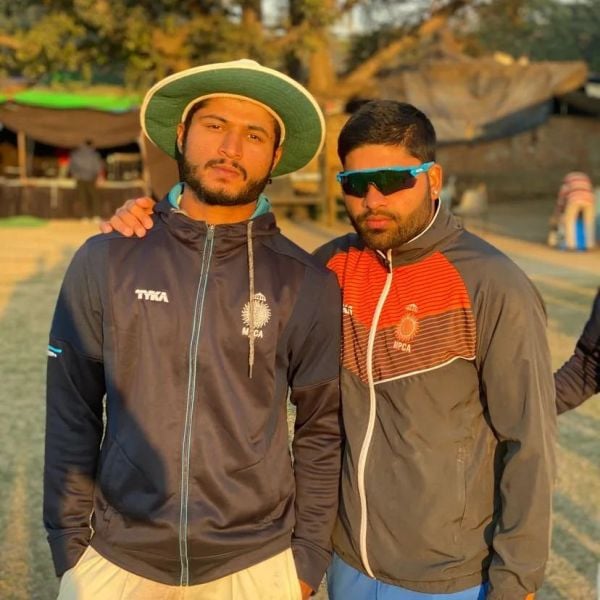 Arshad Khan (left) with his teammate at CK Naidu tournament