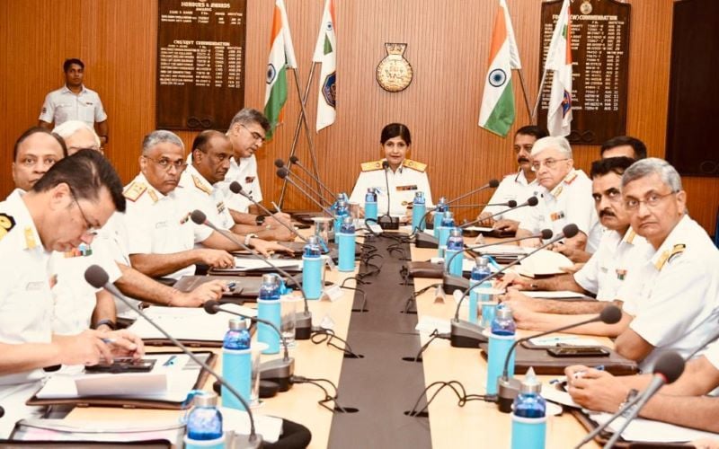 Arti Sarin addressing a conference with high-ranking Indian Navy in it