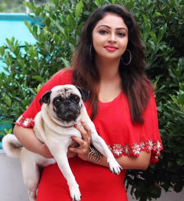 Arundhathi Nair with her pet dog, Tom