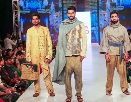 Aryan Arora walking the ramp at a fashion show