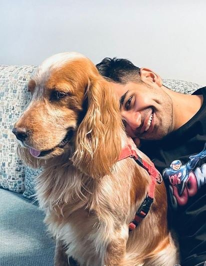 Aryan Arora with a dog