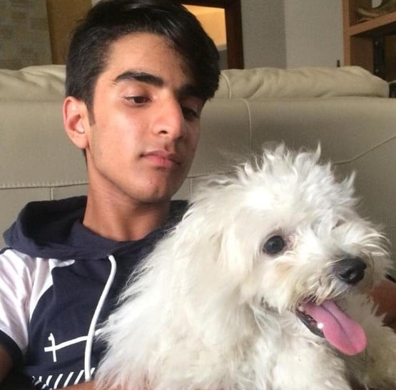 Aryan Kathuria posing with his pet
