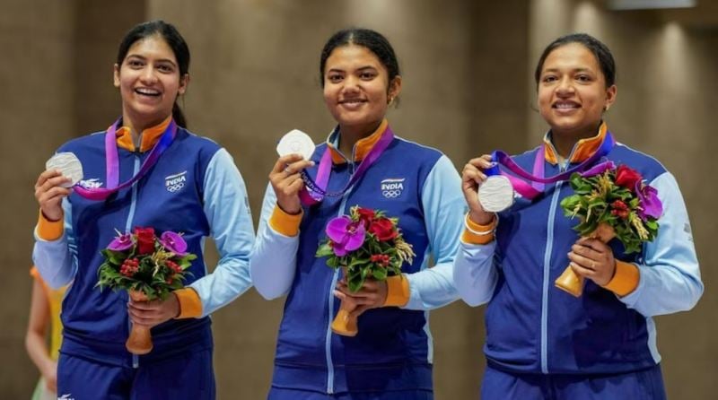 Ashi Chouksey, along with her team, after winning the silver medal at the 2023 Asian Games