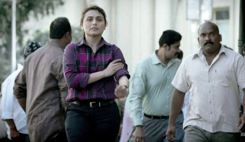 Ashish Warang (as More), along with Rani Mukerji (as Senior Inspector Shivani Shivaji Roy), in a still from the film 