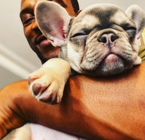 Ashley Walters with his pet dog