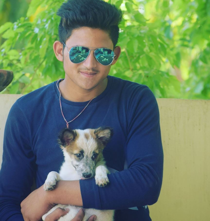 Ashok Sharma with a dog