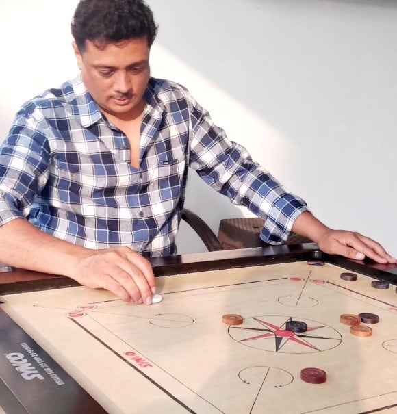 Asim Sarode while playing carom