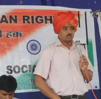 Asim Sarode while talking to the people at a village in Sangli district in Maharashtra