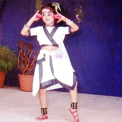 Asin performing in her school