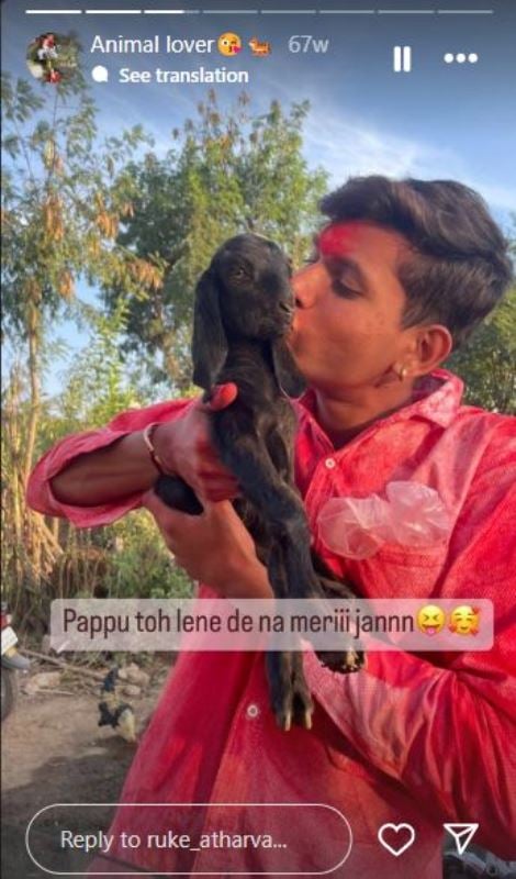 Atharva Ruke posing with a goat