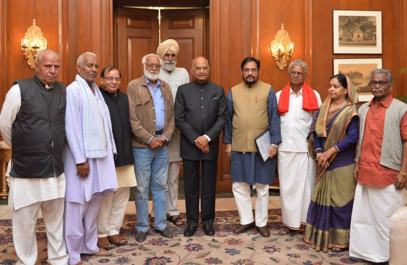 Atul Kumar Anjan with farmers