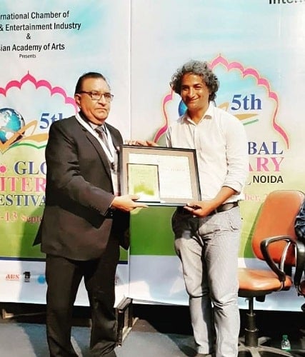 Azhar Iqbal being honoured at an event