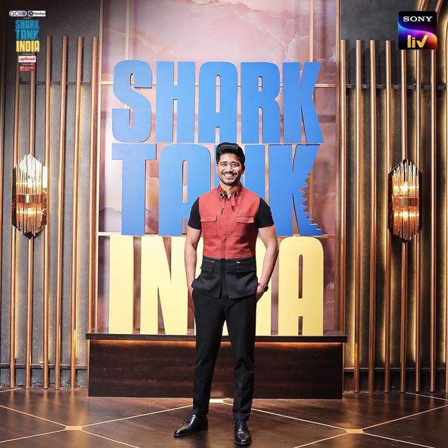 Azhar Iqubal posing on the sets of Shark Tank India