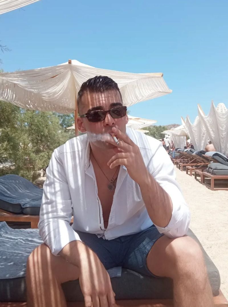 Babis Karatzas, while enjoying smoking