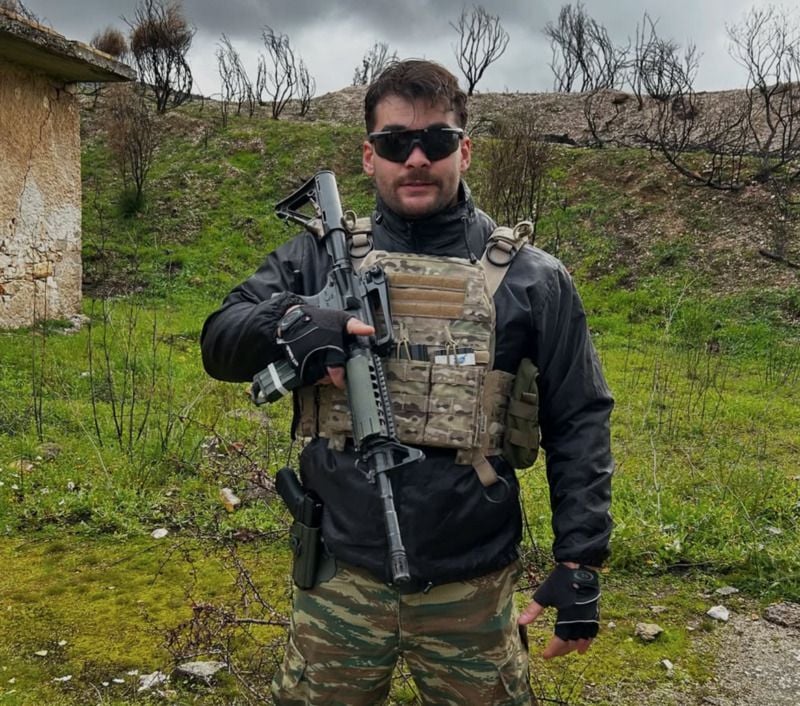 Babis Karatzas, while playing a gun shooting game