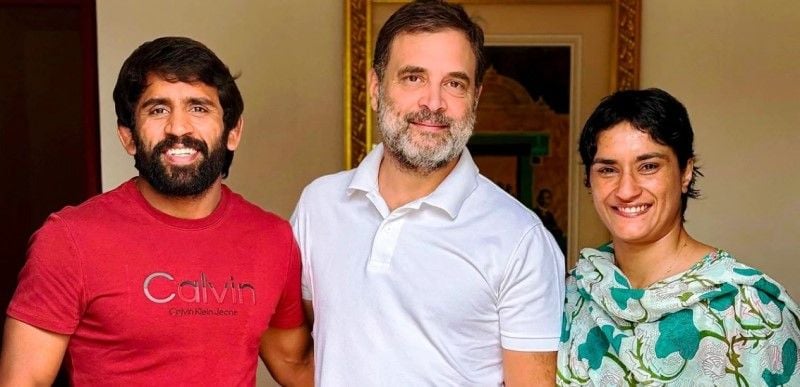 Bajrang Punia and Vinesh Phogat with Rahul Gandhi