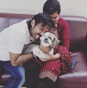 Bala with his pet dog and ex-wife
