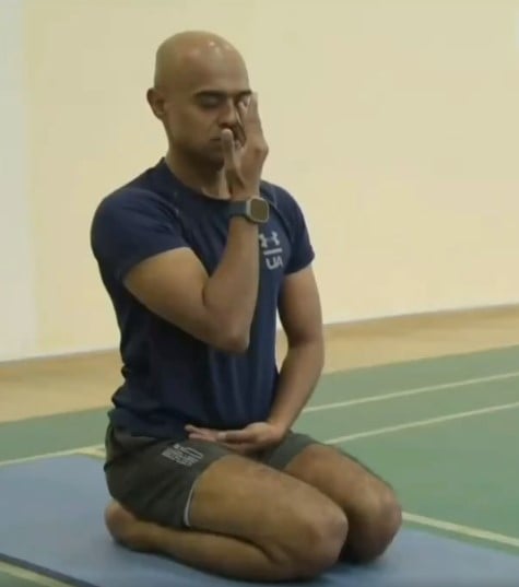 A photo of Balakrishnan Nair taken while he was doing yoga