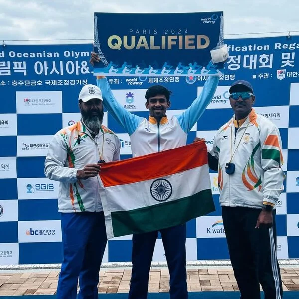 Balraj Panwar next to his coaches with his ticket to Paris 2024 Olympics