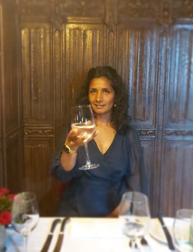 Balvinder Sopal while enjoying an alcoholic beverage