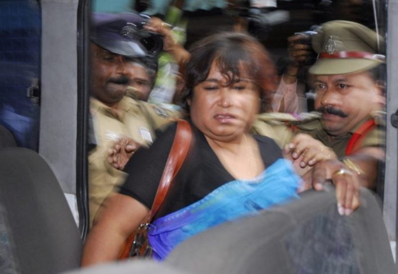 Bangladeshi writer Taslima Nasrin when escorted out of the press club by the Indian Police after she was manhandled by angry Muslim protesters in Hyderabad, India, Thursday, 9 August 2007