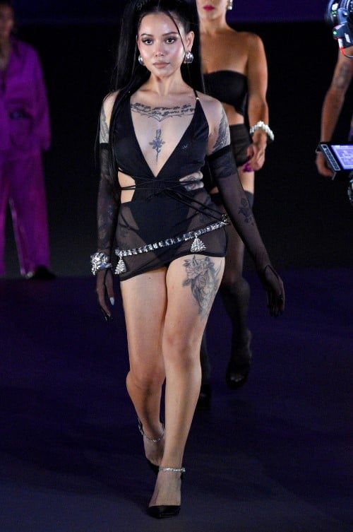 Bella Poarch while walking a ramp