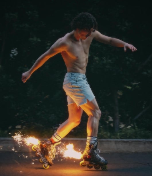 Benson Boone while practicing rollerblading