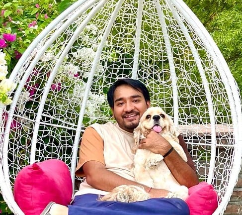 Bhupender Rawat with his pet dog