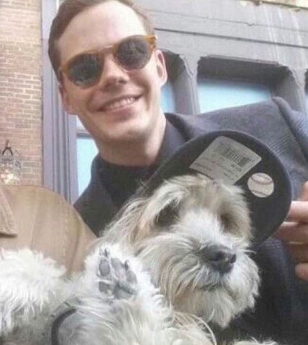 Bill Skarsgård with a dog